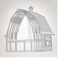 A tall woodframe structure with a gambrel roof