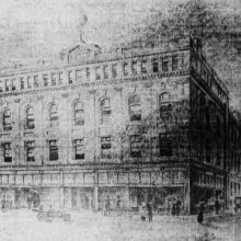 Image 7: Black and white newspaper illustration of original Birk Building.