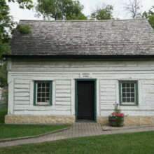 Image 2: Facade of the secondary building on the property that sits to the left of the Seven Oaks House