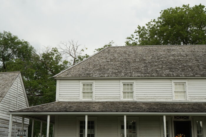 Seven Oaks House Museum with trees visible behind it.