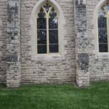 Image 12: Gothic style arched windows on the facade of St. John's Cathedral