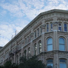 Image 4: Looking up at the facade of the Telegram Building from the corner of Albert Street an McDermot Avenue