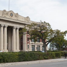 Image 2: The front entrance of Winnipeg’s Canadian Pacific Railway Station with a hedge in front