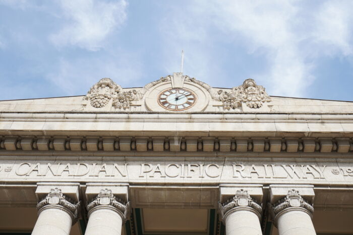 The clock above the front entrance of Winnipeg’s Canadian Pacific Railway Station with the text “CANADIAN PACIFIC RAILWAY.”