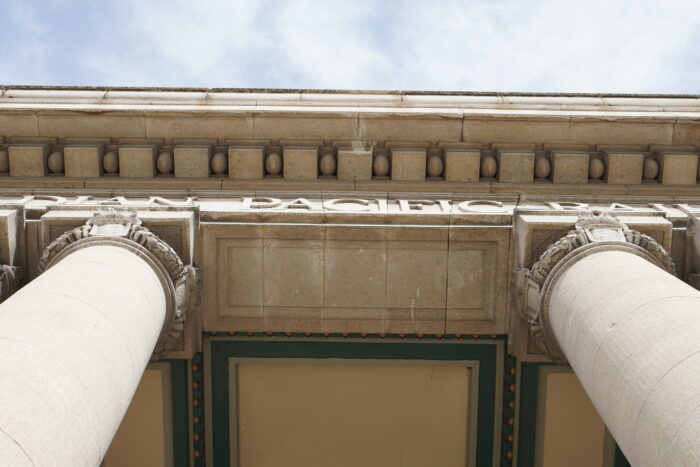 Looking up the front columns and detailed cornice of CPR Station