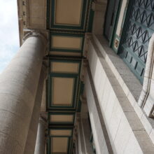 Image 4: Looking up under the columned entrance