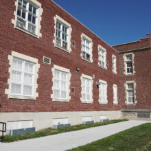 Image 1: First and second storey windows on side of school