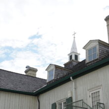 Image 3: Roof of the St. Boniface Museum featuring 2 dormer windows and a chimney