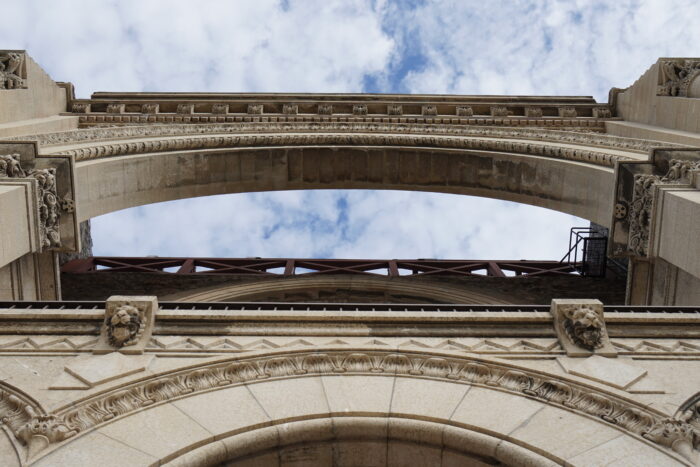 Looking up at the facade arch