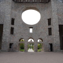 Image 5: Interior view of the original facade of the St Boniface Cathedral featuring the space of the former rose window and the space form the original entrances