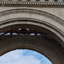 Image 18: Decorative architectural details in stone above the space for the original Rose window