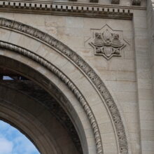 Image 19: Decorative architectural details in stone to the right of the space for the original Rose window