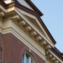 Image 1: Details of the pediment on the front facade of the St. Boniface City Hall