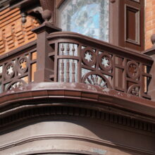 Image 10: Ornate railing on second floor balcony