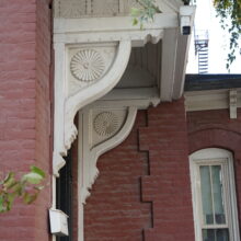 Image 4: Ornate cornice above front entrance