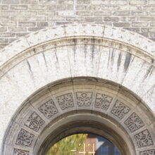 Image 5: Ornamental architectural details above the main doors