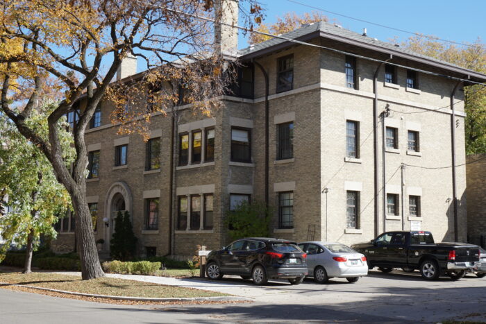 The West side of Wardlaw Apartments, with adjacent parking lot.