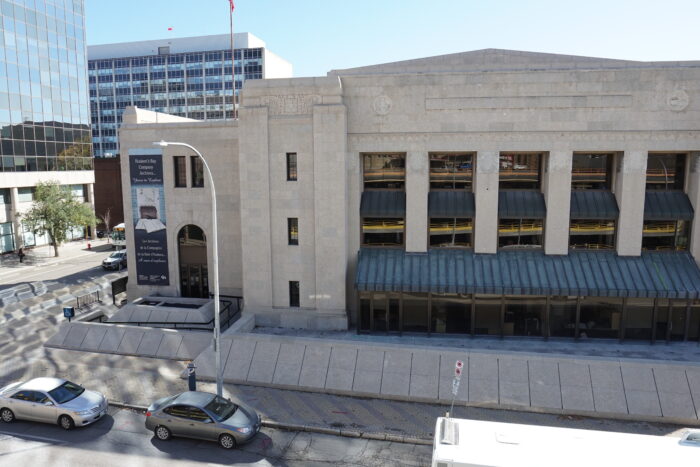 Facade of Civic Auditorium with modern overhang on ground floor