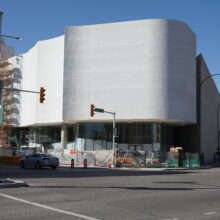 Image 1: Facade of the Winnipeg Art Gallery-Qaumajuq facing the corner of St Mary Avenue and Memorial Boulevard