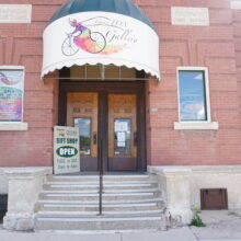 Image 3: Selkirk Post Office building front entrance with awning