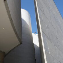 Image 4: Shadowed narrow space between the original building of the Winnipeg Art Gallery and the newest addition, Qaumajuq