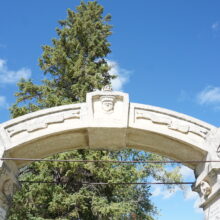 Image 8: Arch of St. Andrews Church outdoor stone graveyard portal.