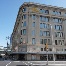 Image 8: Facade of the Hudson's Bay Company Building from the corner of Portage Ave and Memorial Blvd