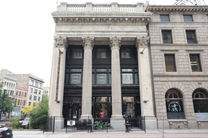 Winnipeg’s Bank of Toronto building with a fenced in patio in front.