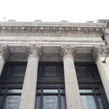 Image 1: Looking up at the capital and cornice details of Winnipeg’s Bank of Toronto building.