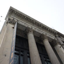 Image 2: Looking up at the capital and cornice details of Winnipeg’s Bank of Toronto building.