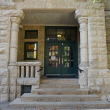 Image 4: Front detailed stone entrance of Isbister School