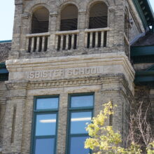 Image 7: Three open arched windows with no glass at top of tower