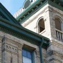 Image 14: Cornice of tower and open arched windows