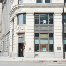 Looking North at the Union Trust Building's façade, a sign on the building reads Birks.