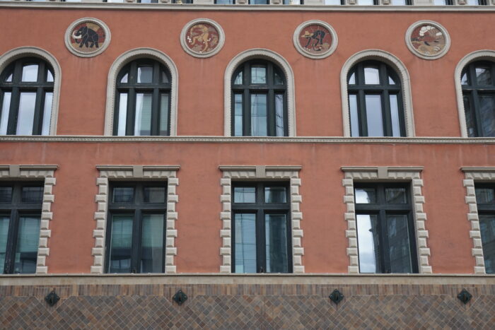 Windows on the second and third storey of the Birks Building (Former YMCA).