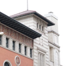 Image 1: The eaves and ornamentation along the fourth storey of the Birks Building (Former YMCA).