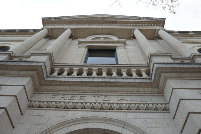 Looking up at the front facade of Winnipeg’s Carnegie Library