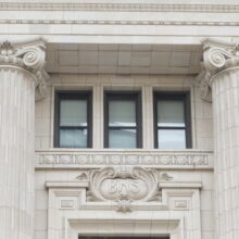 Image 4: 3rd floor windows with decorative border and BNS motif