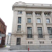 Image 6: Looking at side rear facade of Bank of Nova Scotia building