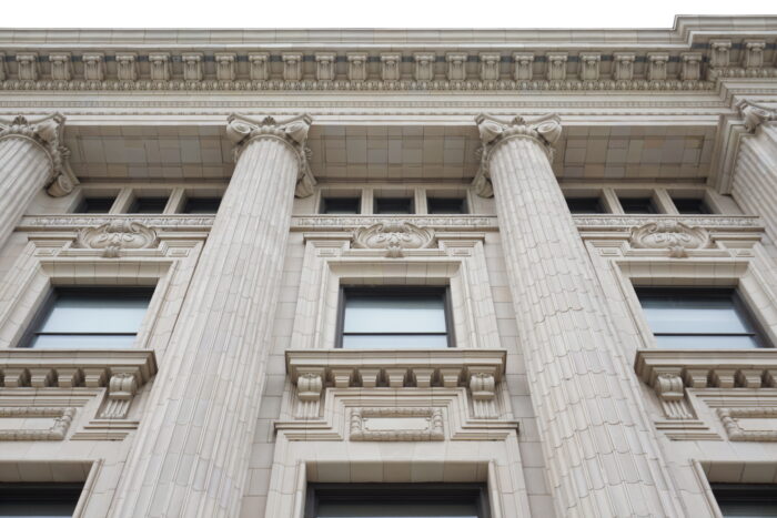 Looking up at the facade of Winnipeg’s downtown Bank of Nova Scotia building.