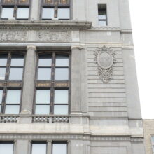 Image 4: Decorative architectural details on the exterior walls of the building facade