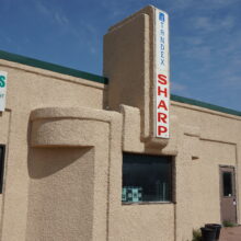 Image 2: Greenings Garage building front.