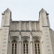 Image 3: Looking up one of the two towers of Knox Church featuring decorative details like tracery at the top