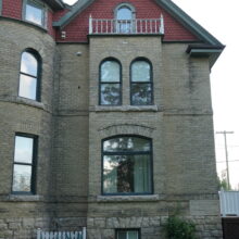 Image 5: Side of house with tower on the left