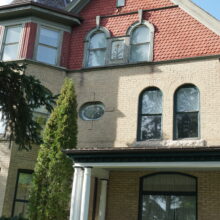 Image 7: Looking up at 2nd & 3rd floor arched windows