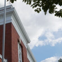 Image 5: Looking up at the roofline of the Neepawa Post Office