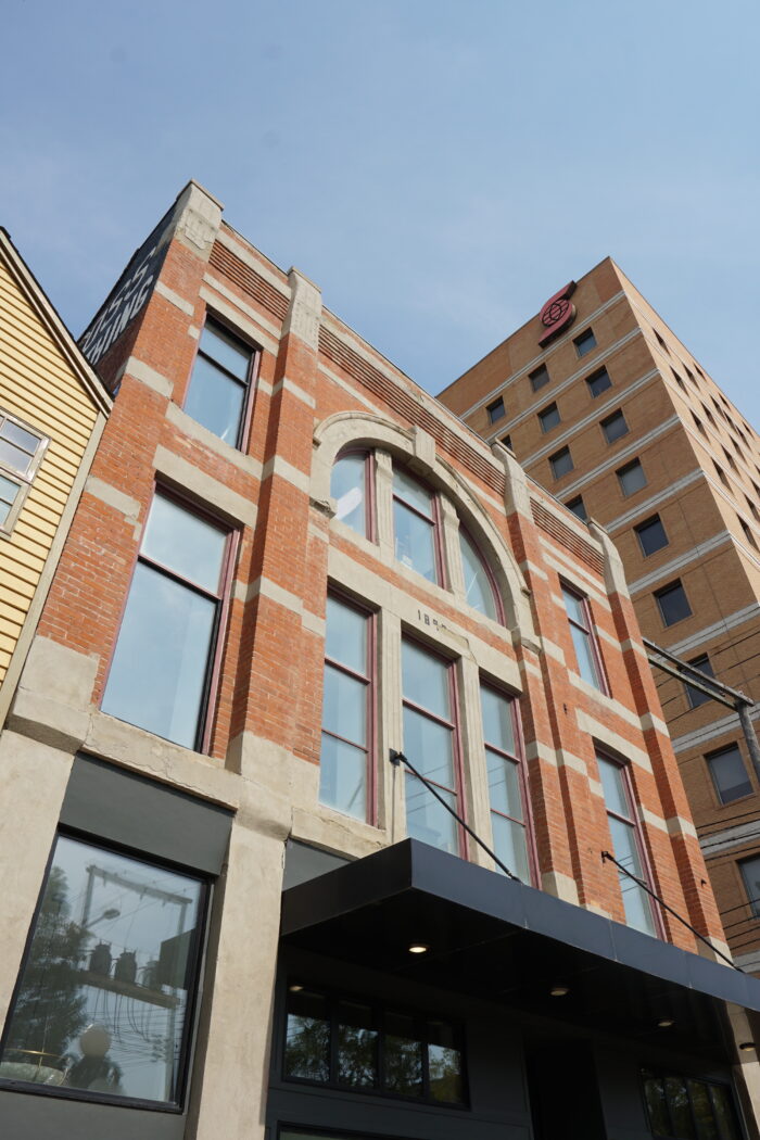 The Fraser Block with a marquee over the front entrance.