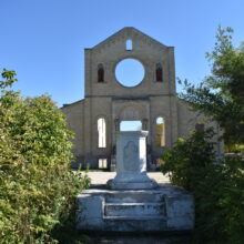 Image 2: The front facade of the Trappist Monastery Church from the inside. The windows have no glass.