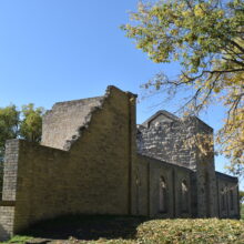 Image 16: A side view of the front entrance of the Trappist Monastery Church.