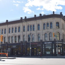 Image 7: Facade of the MacDonald Block viewed from across Main Street